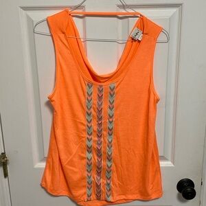 Daytrip tank size large. Orange with Aztec print. Scoop back and neckline.